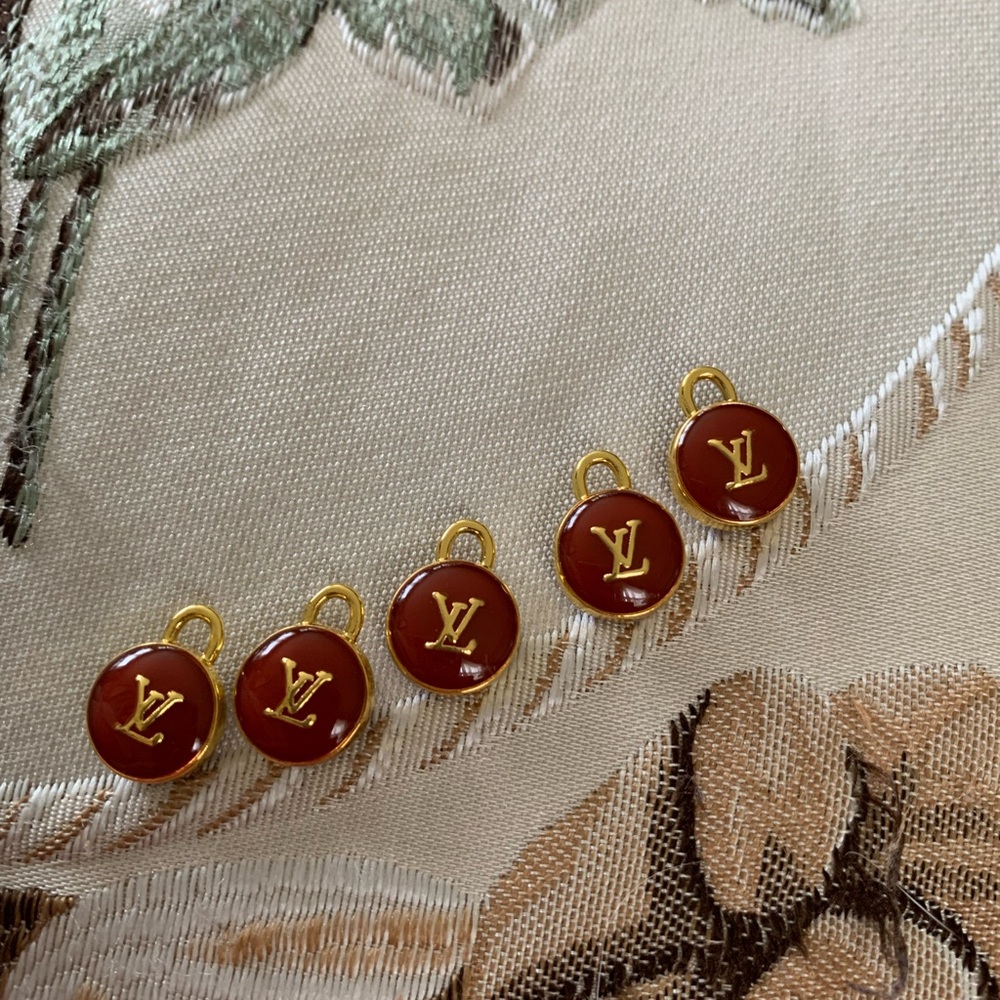 Authentic rare, Louis Vuitton Red and Gold Charms